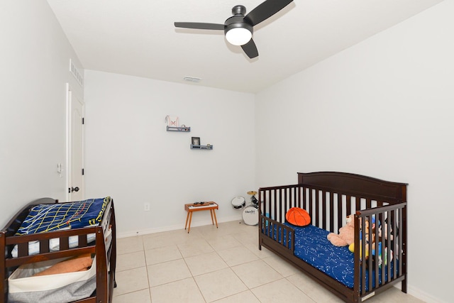 1222 SW Granadeer St, Port Saint Lucie, FL 34983 - bedroom featuring light tile patterned floors, ceiling fan, and baseboards