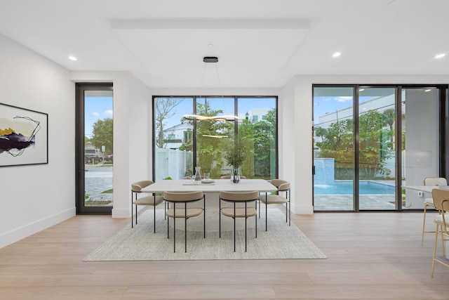 201 SE 4th Ave, Delray Beach, FL 33483 - dining room featuring plenty of natural light, light wood-type flooring, recessed lighting, and baseboards