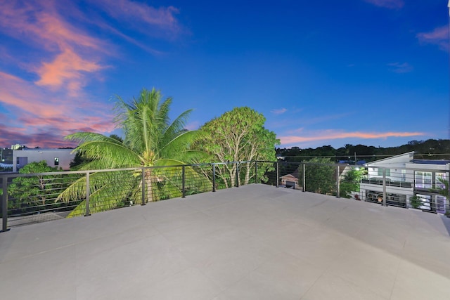 201 SE 4th Ave, Delray Beach, FL 33483 - patio terrace at dusk with a patio