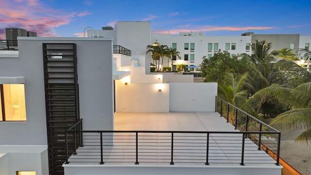 201 SE 4th Ave, Delray Beach, FL 33483 - patio terrace at dusk featuring a balcony