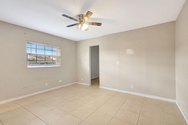 3854 Van Cott Cir, West Palm Beach, FL 33403 - empty room with ceiling fan, baseboards, and light tile patterned floors