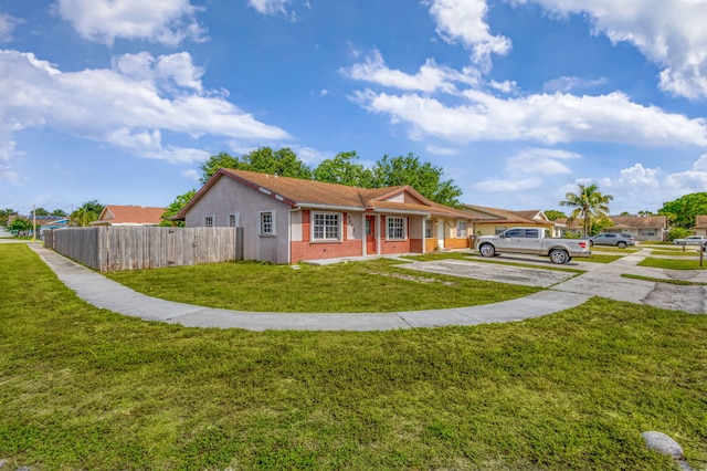 3854 Van Cott Cir, West Palm Beach, FL 33403 - ranch-style home featuring brick siding, stucco siding, and driveway