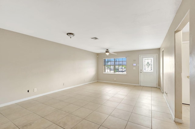 3854 Van Cott Cir, West Palm Beach, FL 33403 - empty room featuring a ceiling fan, light tile patterned floors, and baseboards