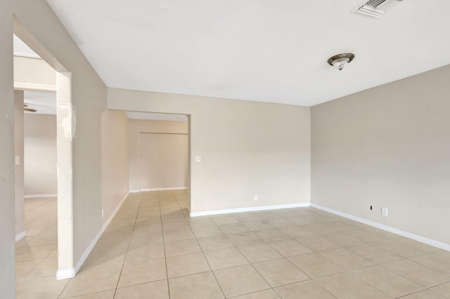 3854 Van Cott Cir, West Palm Beach, FL 33403 - spare room featuring light tile patterned flooring and baseboards