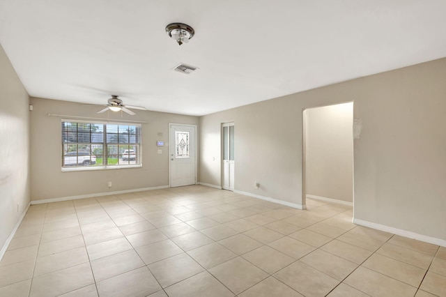 3854 Van Cott Cir, West Palm Beach, FL 33403 - spare room with ceiling fan, light tile patterned floors, and baseboards