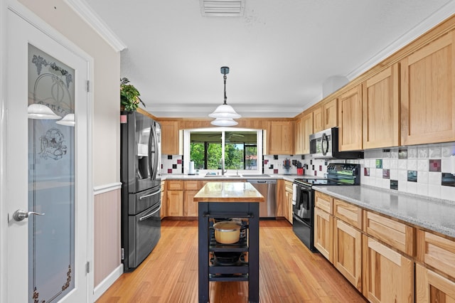 11447 Orange Grove Blvd, West Palm Beach, FL 33411 - kitchen with appliances with stainless steel finishes, tasteful backsplash, light brown cabinetry, light wood-style floors, and a sink