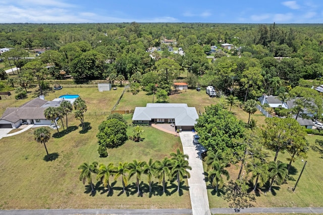 11447 Orange Grove Blvd, West Palm Beach, FL 33411 - aerial overview of property's location featuring a heavily wooded area