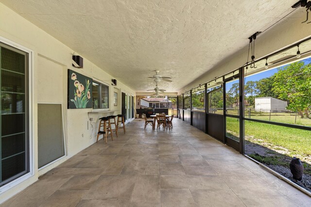11447 Orange Grove Blvd, West Palm Beach, FL 33411 - sunroom / solarium featuring a ceiling fan