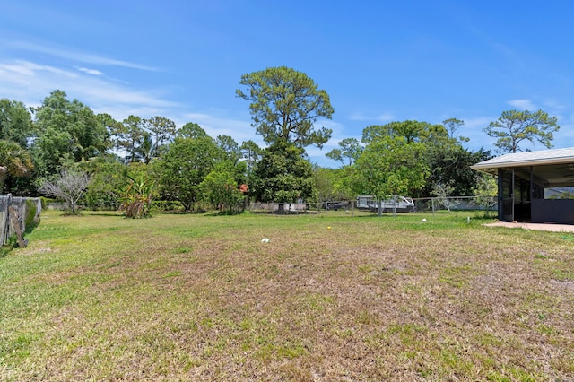 11447 Orange Grove Blvd, West Palm Beach, FL 33411 - view of yard with a sunroom