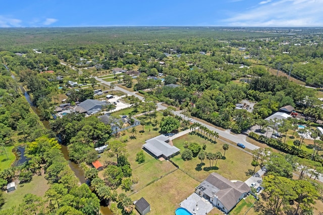 11447 Orange Grove Blvd, West Palm Beach, FL 33411 - aerial overview of property's location with a forest and nearby suburban area