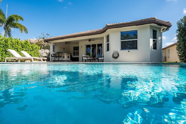 7267 Prudencia Dr, Lake Worth, FL 33463 - outdoor pool with a ceiling fan and a patio area