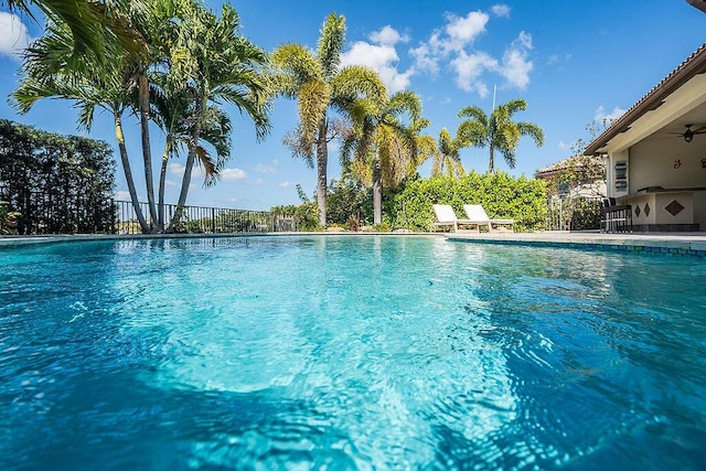 7267 Prudencia Dr, Lake Worth, FL 33463 - view of swimming pool with a ceiling fan and fence