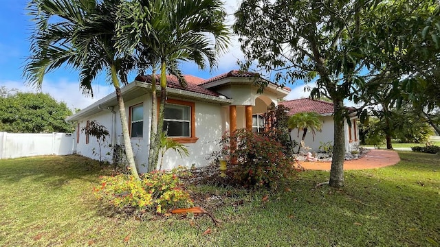2332 SW Savona Blvd, Port Saint Lucie, FL 34953 - view of home's exterior with stucco siding and a tile roof