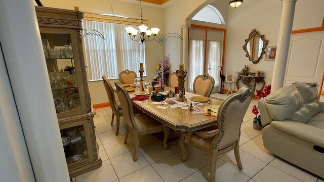 2332 SW Savona Blvd, Port Saint Lucie, FL 34953 - dining space with light tile patterned floors, healthy amount of natural light, and arched walkways