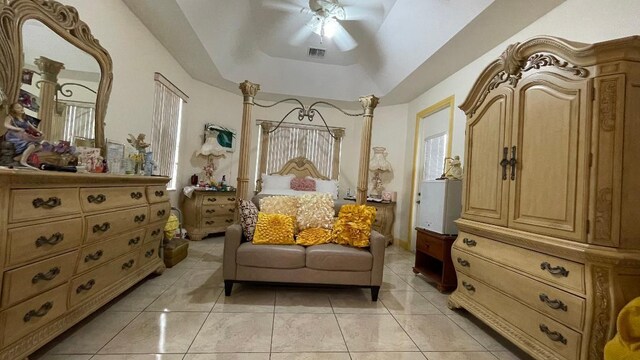 2332 SW Savona Blvd, Port Saint Lucie, FL 34953 - bedroom with a raised ceiling, a ceiling fan, and light tile patterned flooring