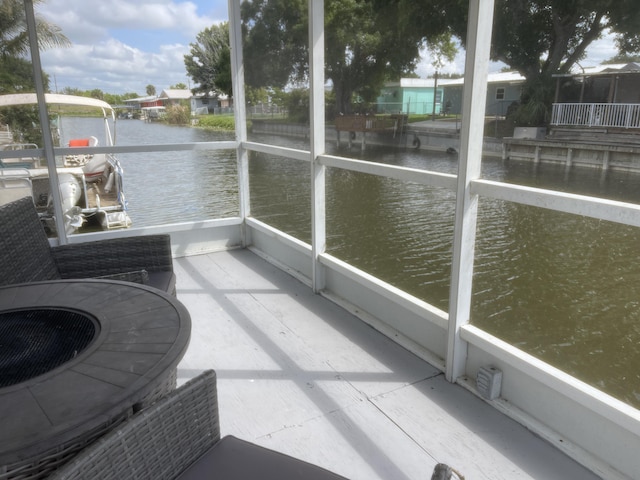 1099 7th St, Okeechobee, FL 34974 - sunroom / solarium featuring a water view