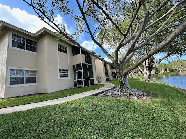 720 Cypress Ln Unit K, Deerfield Beach, FL 33064 - view of building exterior featuring a water view
