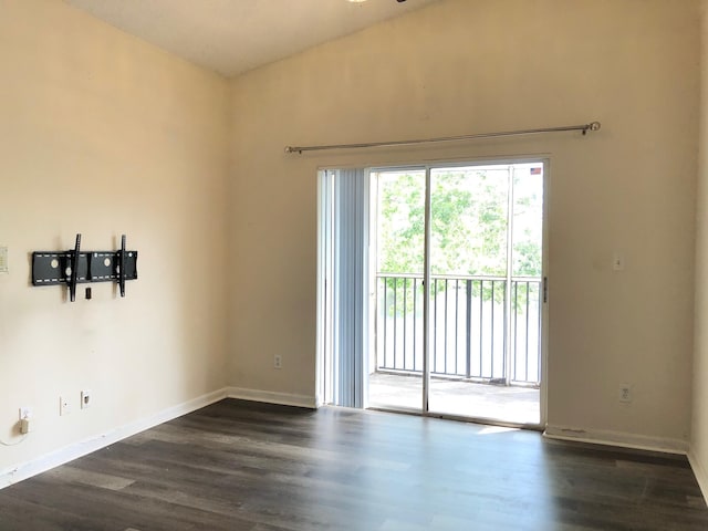 720 Cypress Ln Unit K, Deerfield Beach, FL 33064 - empty room with dark wood-type flooring and baseboards