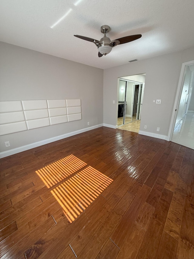 310 SE 2nd Ave Unit A3, Deerfield Beach, FL 33441 - unfurnished room with wood-type flooring, a ceiling fan, and baseboards
