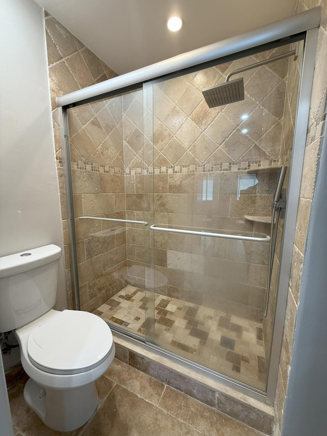 310 SE 2nd Ave Unit A3, Deerfield Beach, FL 33441 - bathroom with toilet, a stall shower, and recessed lighting