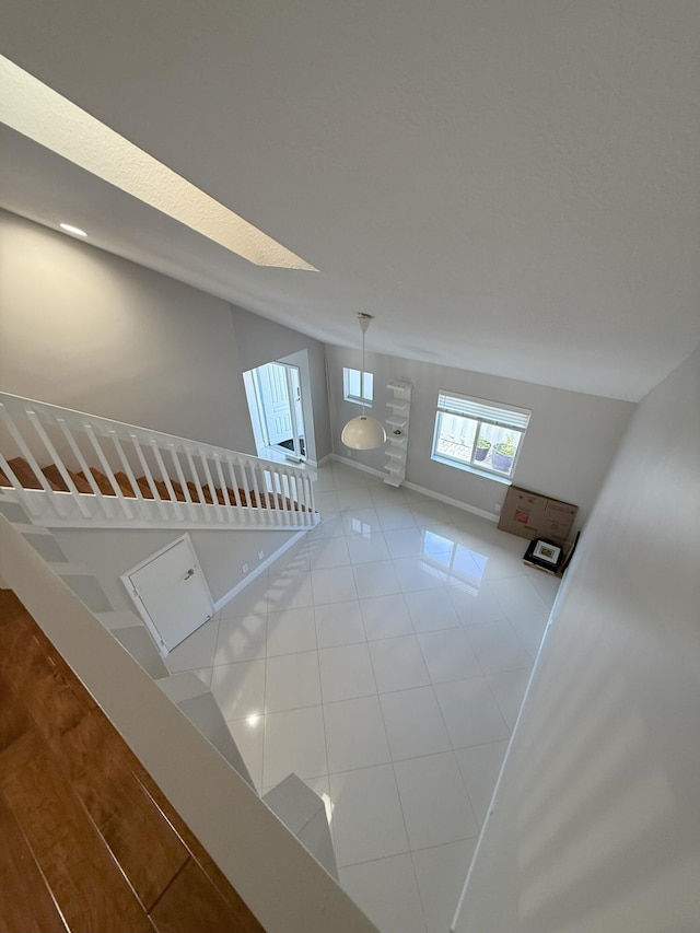 310 SE 2nd Ave Unit A3, Deerfield Beach, FL 33441 - stairs with tile patterned flooring and baseboards
