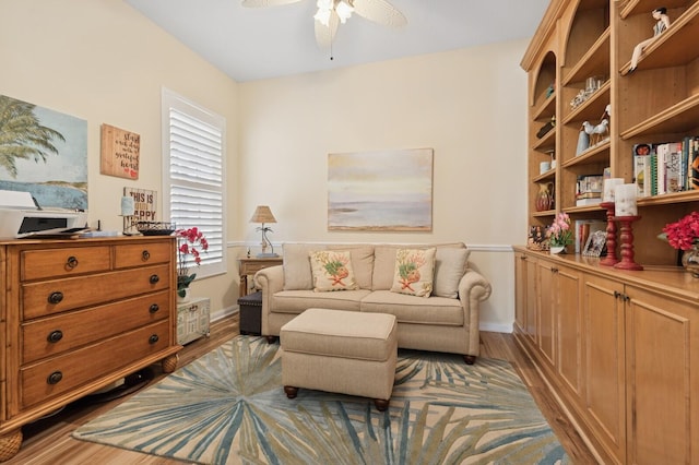 2596 Irma Lake Dr, West Palm Beach, FL 33411 - living area featuring wood finished floors, a ceiling fan, and baseboards