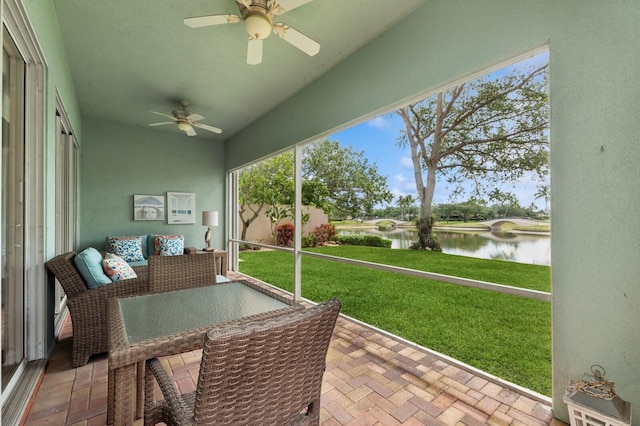 2596 Irma Lake Dr, West Palm Beach, FL 33411 - sunroom featuring a water view, ceiling fan, and vaulted ceiling