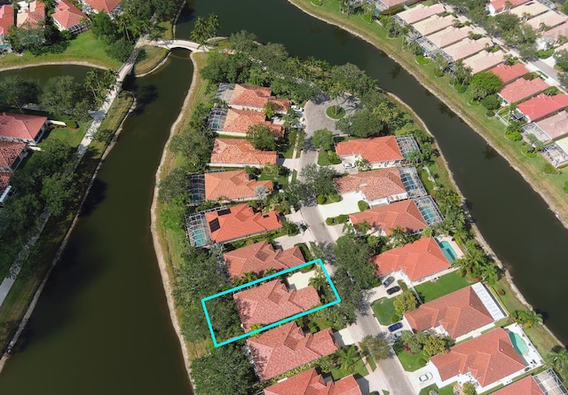 2596 Irma Lake Dr, West Palm Beach, FL 33411 - aerial view of residential area with property boundaries highlighted and a nearby body of water