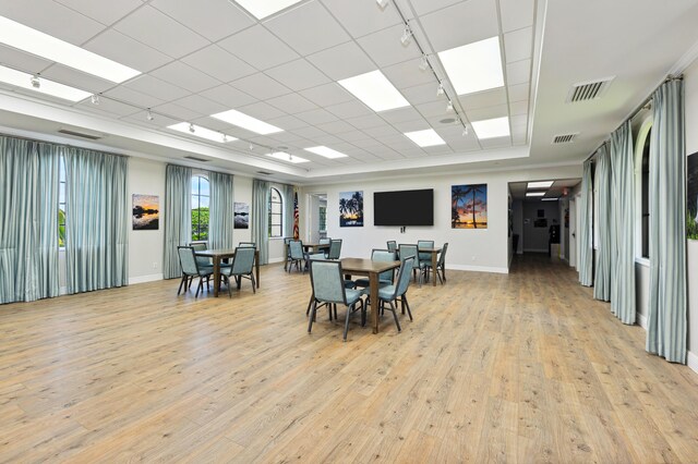 2596 Irma Lake Dr, West Palm Beach, FL 33411 - dining room with baseboards, light wood-type flooring, track lighting, and a drop ceiling