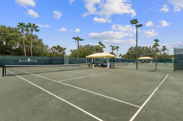 2596 Irma Lake Dr, West Palm Beach, FL 33411 - view of tennis court with fence