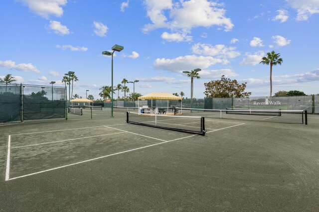 2596 Irma Lake Dr, West Palm Beach, FL 33411 - view of tennis court with fence