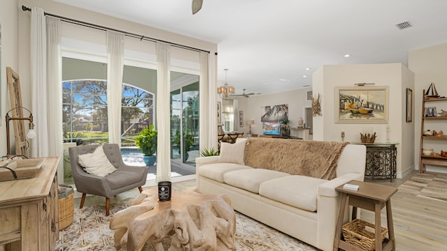6193 Winding Lake Dr, Jupiter, FL 33458 - living room featuring light wood-style floors and recessed lighting