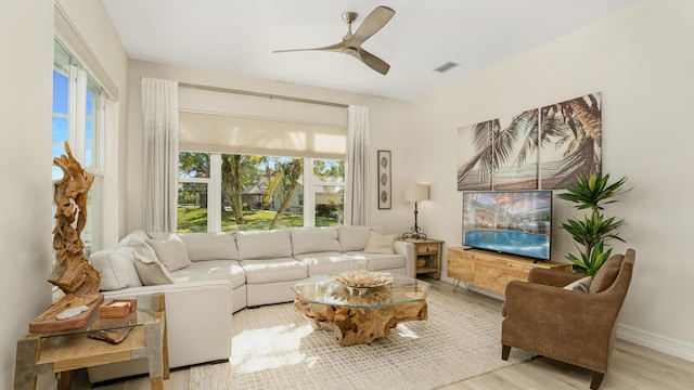 6193 Winding Lake Dr, Jupiter, FL 33458 - living area with wood finished floors, a ceiling fan, and baseboards