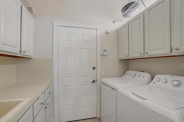 6193 Winding Lake Dr, Jupiter, FL 33458 - laundry room with washer and clothes dryer and cabinet space