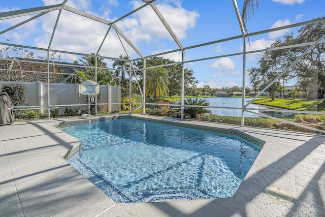 6193 Winding Lake Dr, Jupiter, FL 33458 - swimming pool with a water view, a patio, and glass enclosure