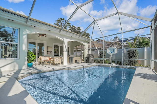 6193 Winding Lake Dr, Jupiter, FL 33458 - view of swimming pool with a patio area, ceiling fan, area for grilling, and a lanai