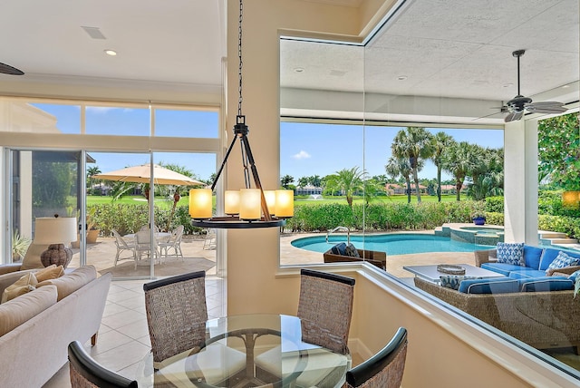view of patio / terrace with an outdoor living space, ceiling fan, a pool with connected hot tub, and outdoor dining space