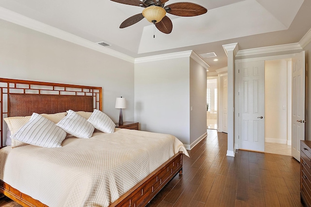 bedroom featuring baseboards, ornamental molding, dark wood-type flooring, and a ceiling fan
