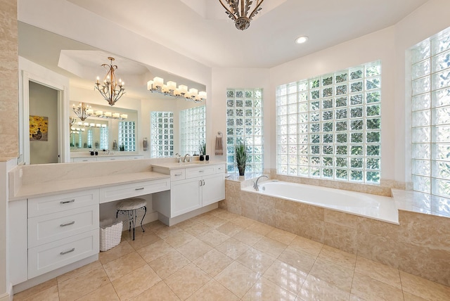 full bath featuring tile patterned floors, plenty of natural light, a bath, vanity, and recessed lighting
