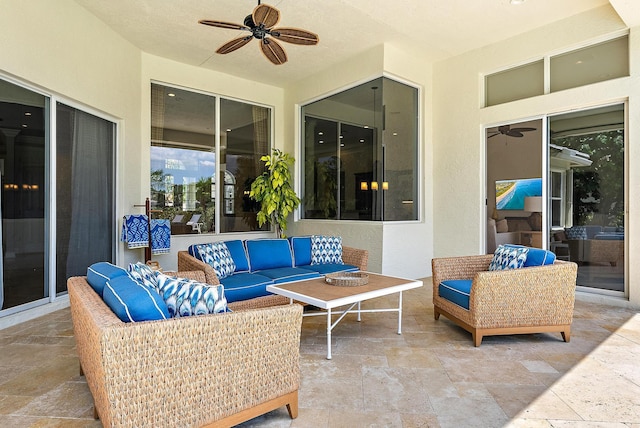 view of patio / terrace featuring an outdoor living space and ceiling fan