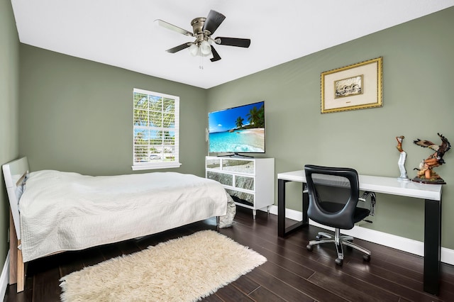 bedroom with wood finished floors, baseboards, and a ceiling fan