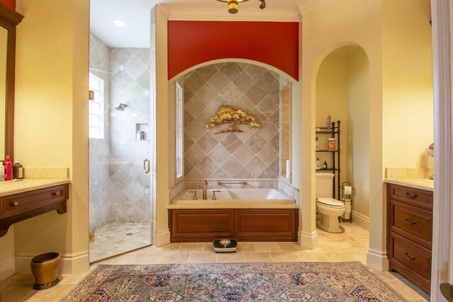 143 SE Bella Strano, Port Saint Lucie, FL 34984 - full bath featuring a stall shower, toilet, a garden tub, ornamental molding, and vanity