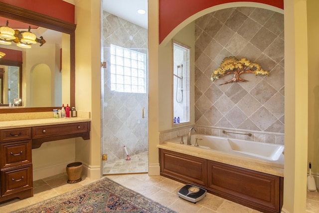 143 SE Bella Strano, Port Saint Lucie, FL 34984 - full bath featuring a stall shower, a bath, tile walls, and vanity