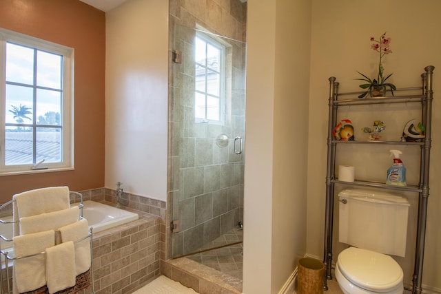143 SE Bella Strano, Port Saint Lucie, FL 34984 - bathroom featuring a shower stall, a garden tub, toilet, and tile patterned flooring