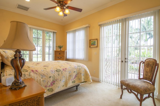 143 SE Bella Strano, Port Saint Lucie, FL 34984 - bedroom with access to outside, ornamental molding, baseboards, carpet, and a ceiling fan
