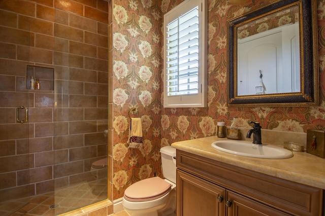 143 SE Bella Strano, Port Saint Lucie, FL 34984 - bathroom with wallpapered walls, toilet, a stall shower, and vanity