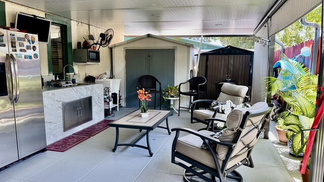 1053 Manor Dr Unit 14-A, Palm Springs, FL 33461 - sunroom / solarium featuring a sink and vaulted ceiling