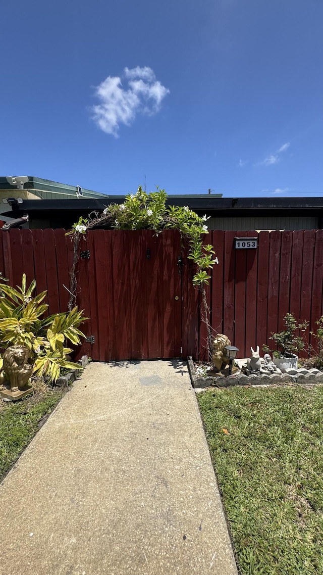1053 Manor Dr Unit 14-A, Palm Springs, FL 33461 - view of yard featuring fence