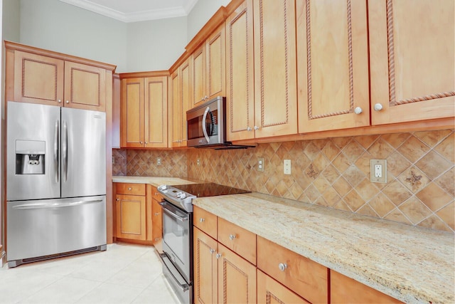 9400 Briarcliff Trce, Port Saint Lucie, FL 34986 - kitchen featuring stainless steel appliances, ornamental molding, decorative backsplash, light tile patterned floors, and light stone countertops