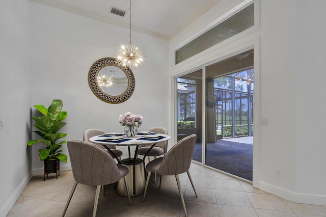 9400 Briarcliff Trce, Port Saint Lucie, FL 34986 - dining room with a chandelier, baseboards, and light tile patterned floors